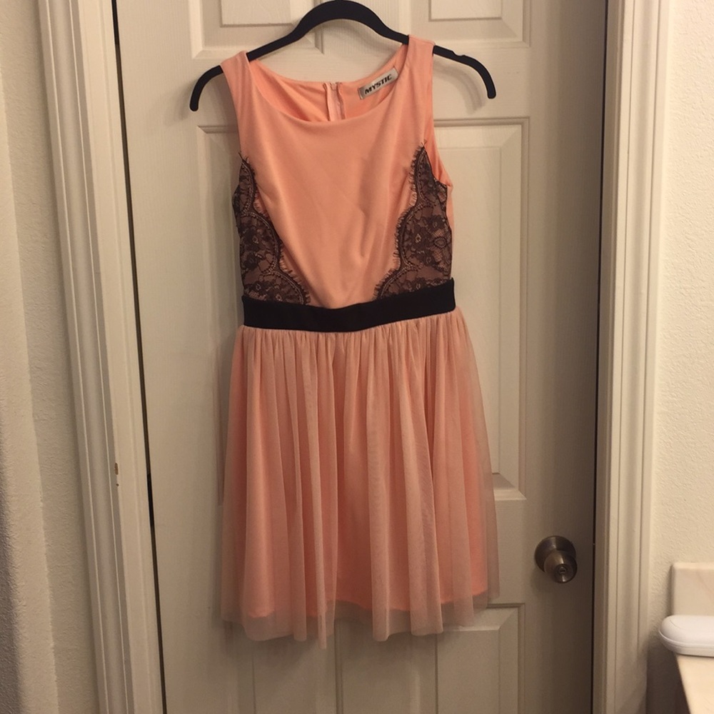Peach dress with black lace detail